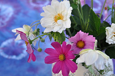 Tie-dyed tablecloth and garden flowers