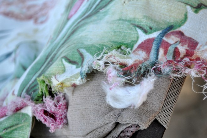 damaged cording, exposed batting