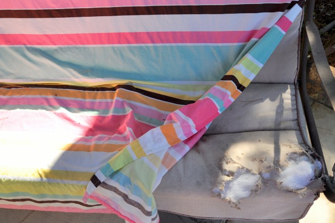 garden swing exposed stuffing