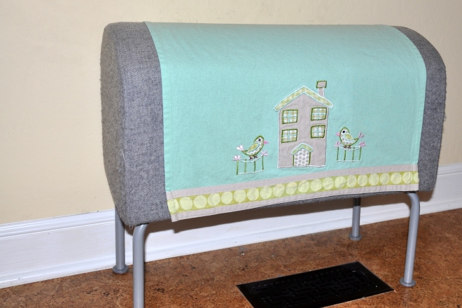 Ikea bench covered with tea towel