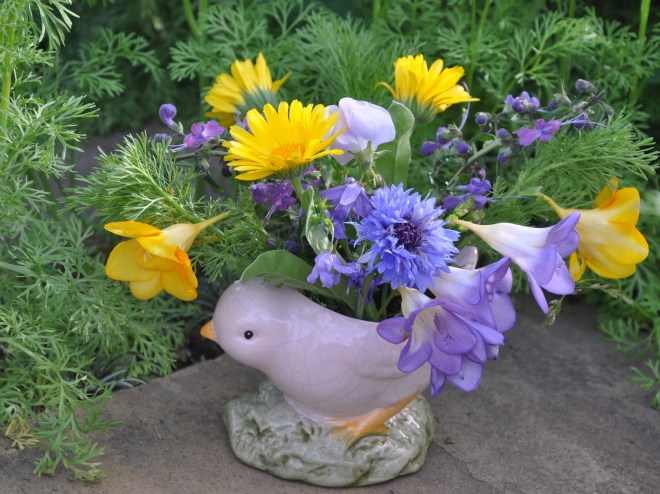 easter flowers in ceramic chick