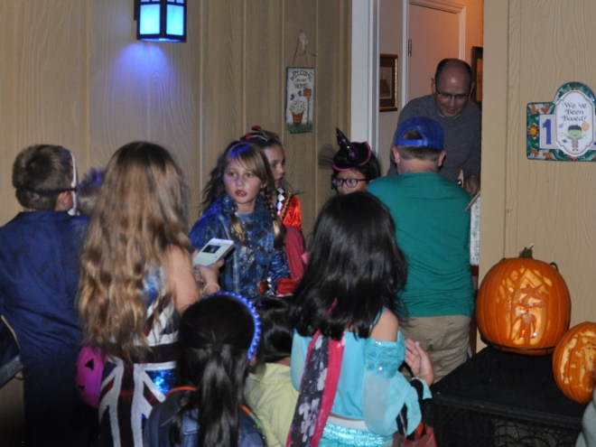 Passing out Halloween candy