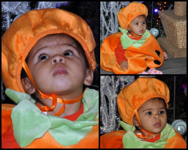 Baby in pumpkin costume