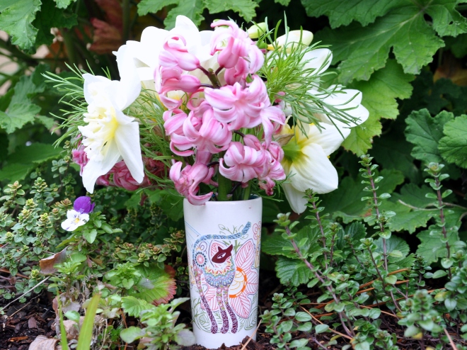 cat vase with spring bulbs