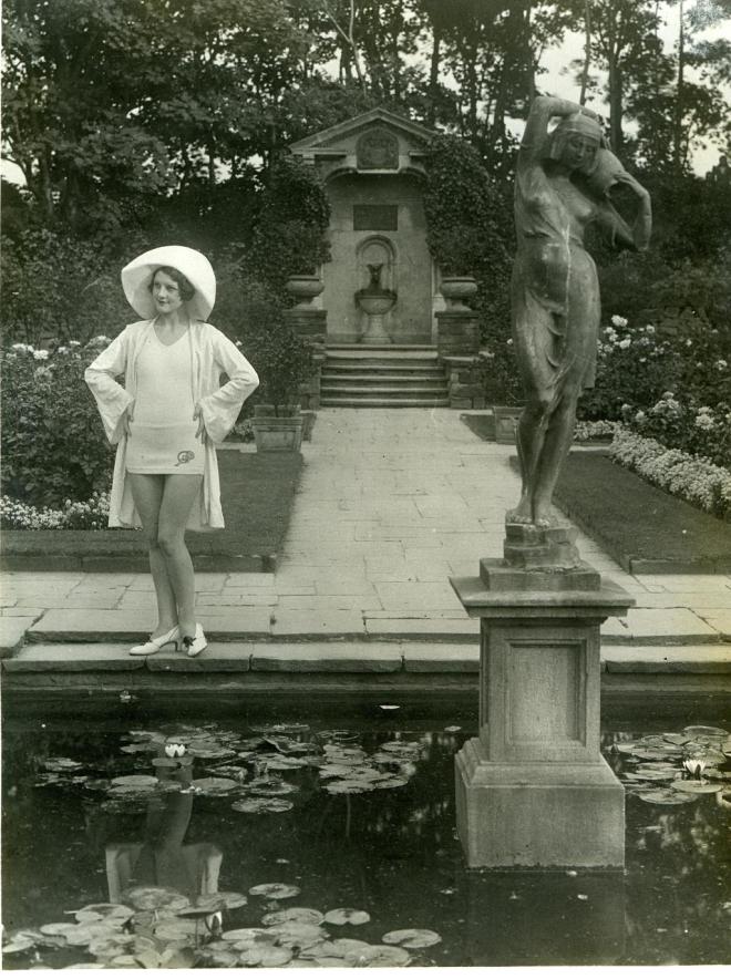 Alys Milner (later Lancaster) posing in a Windsor Wooley bathing costume