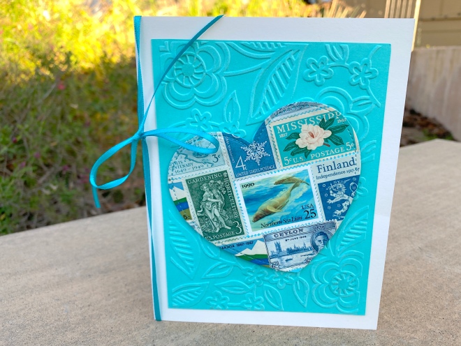 Teal postage stamps heart shaped card