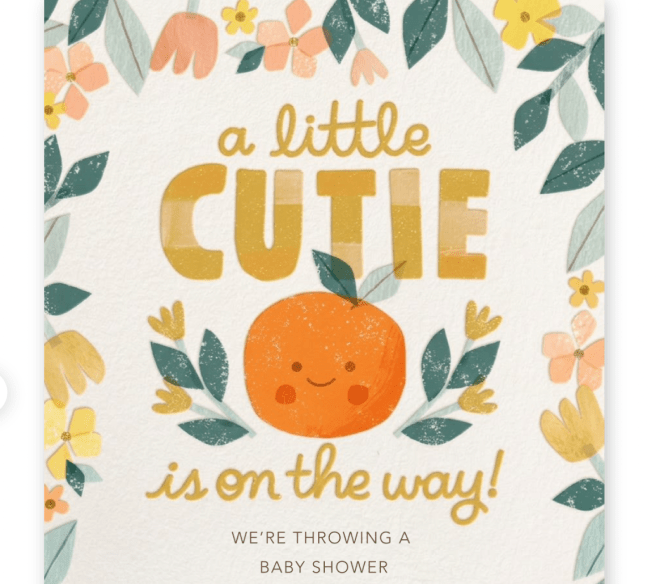 A baby shower invitation featuring an orange character with a smiling face, surrounded by colorful flowers and leaves, with the text 'a little CUTIE is on the way!'